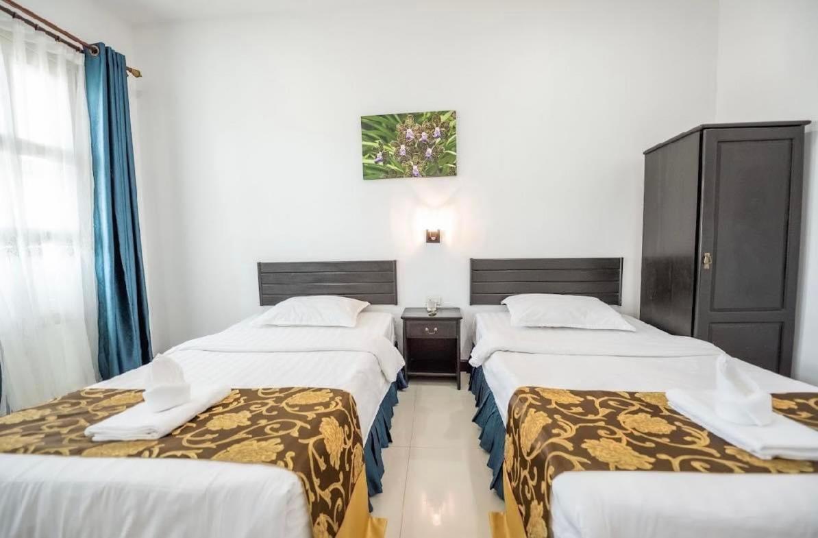 Subinh Hotel And Restaurant Pakse Buitenkant foto